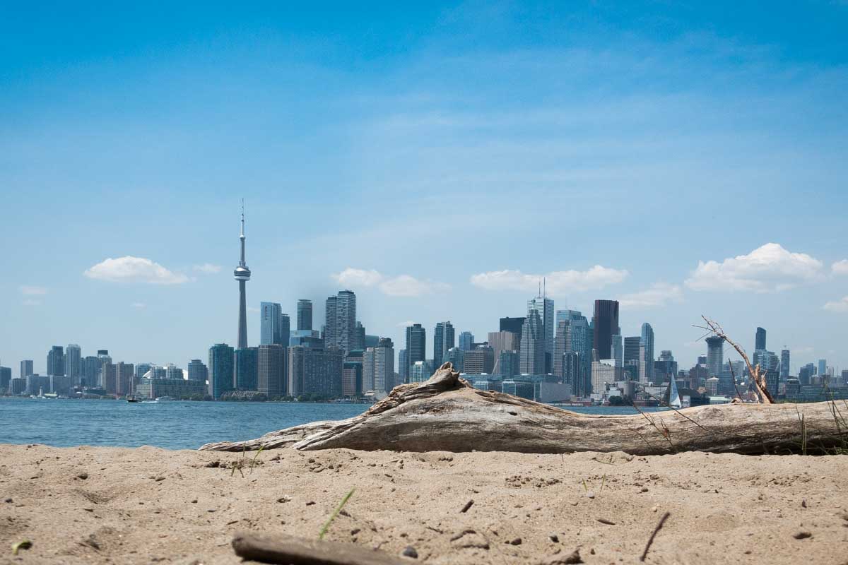 Views of Toronto city from a beach on the Toronto Islands, Canada