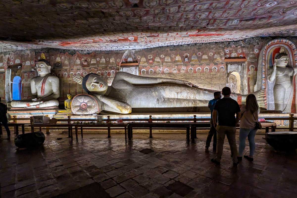 A giant sleeping stone Buddha statue in Dambulla Cave Temple Sri Lanka