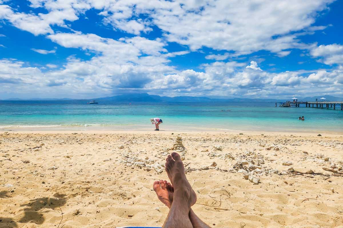 A man puts his feet up at Malamala Beach Club in Fiji