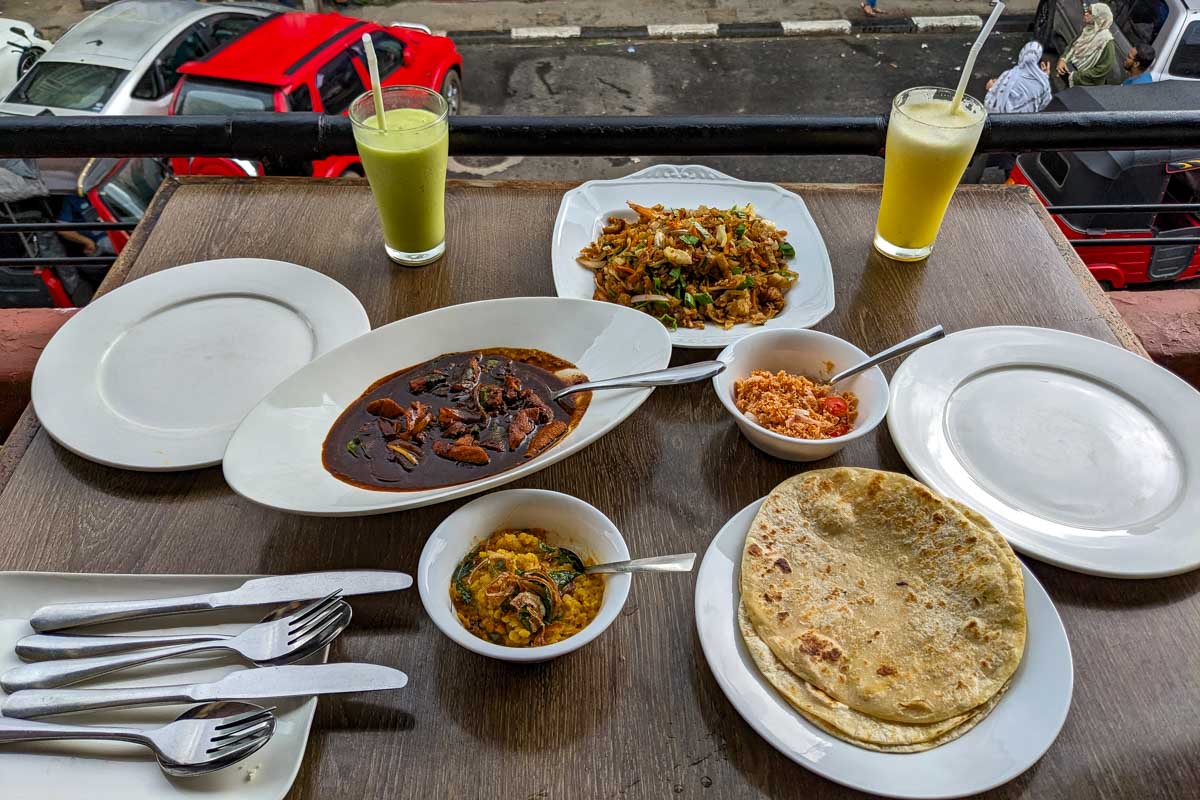 An assortment of local curry and naan served at Cafe 1886 Kandy Sri Lanka