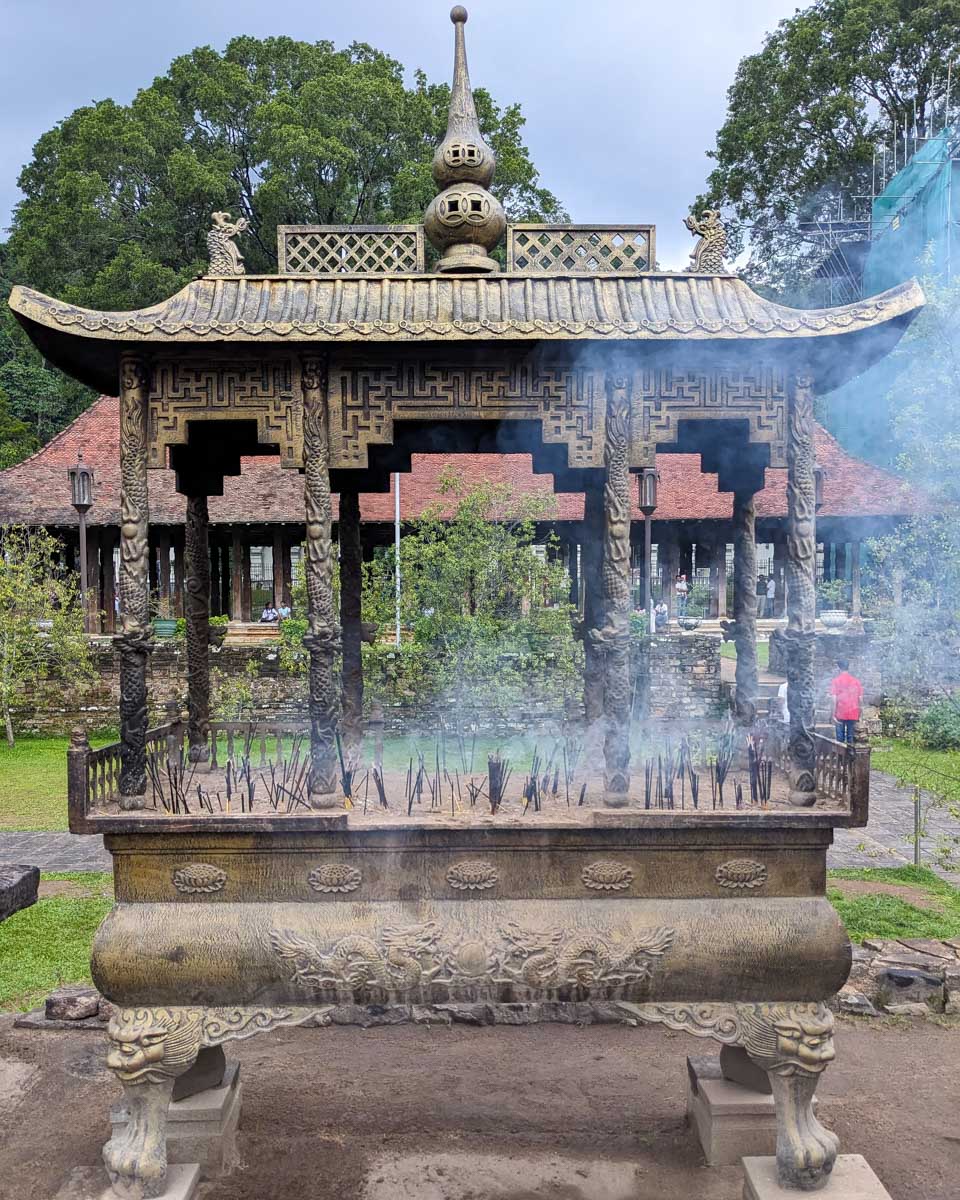 An incense shrine Sacred Tooth Temple Kandy Sri Lanka