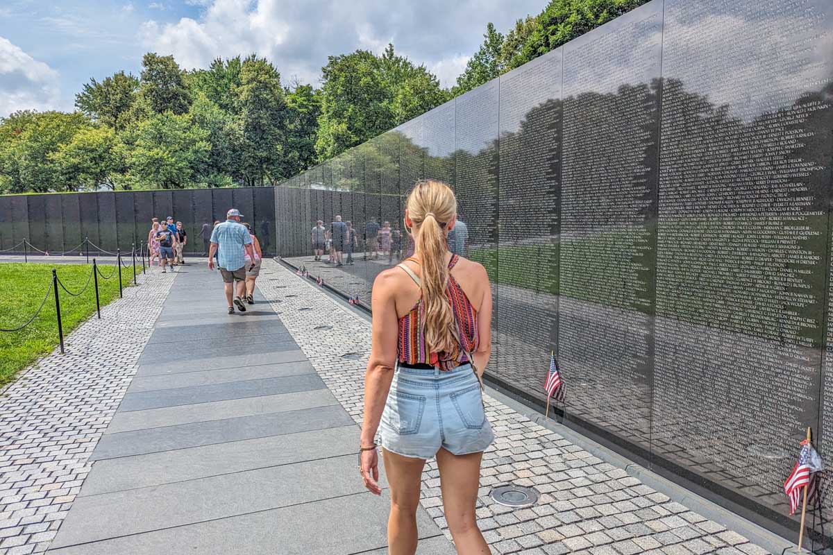 Bailey walks along the Vietnam War Memorial in Washington DC