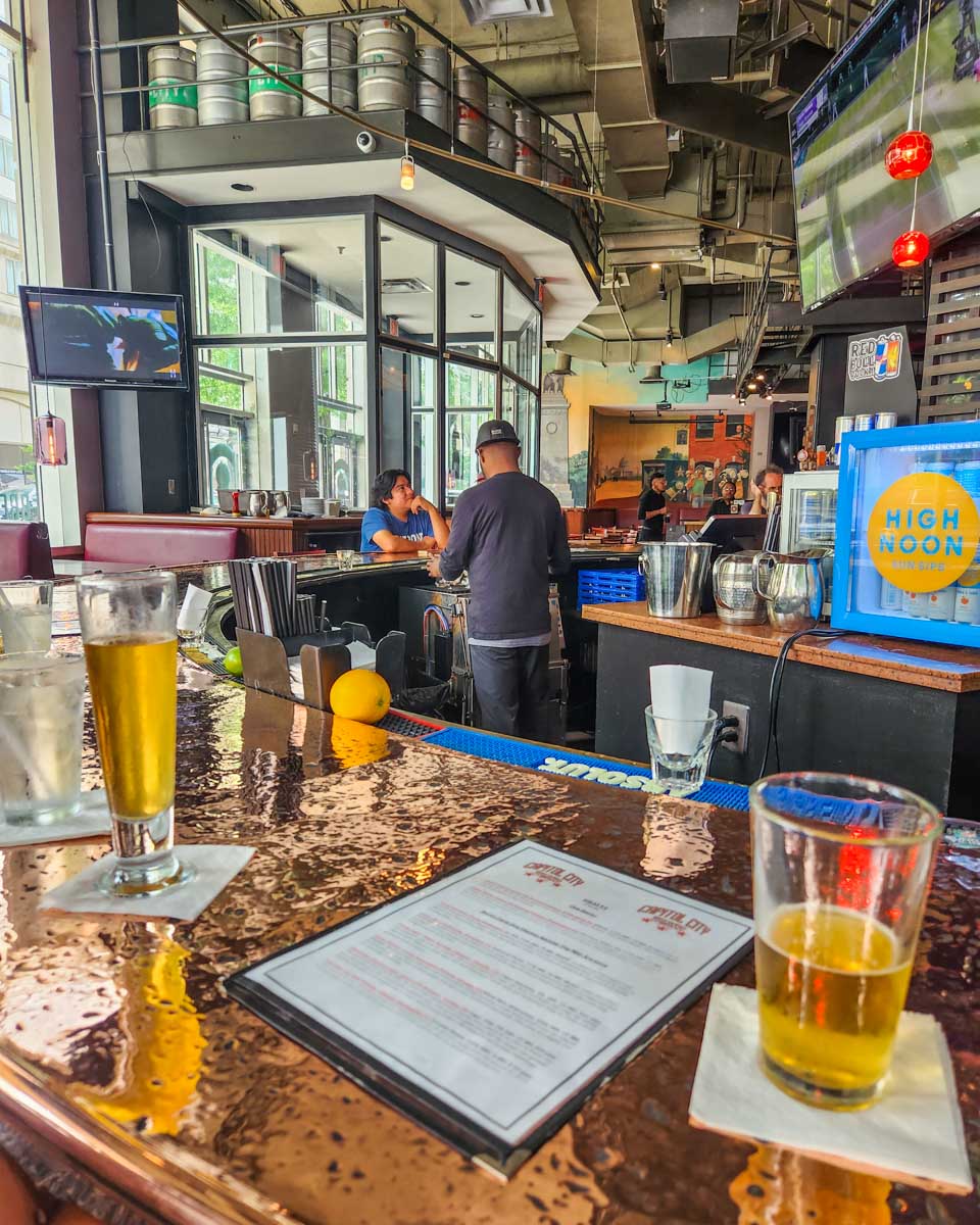Beers at the bar on a pub crawl in Washington DC