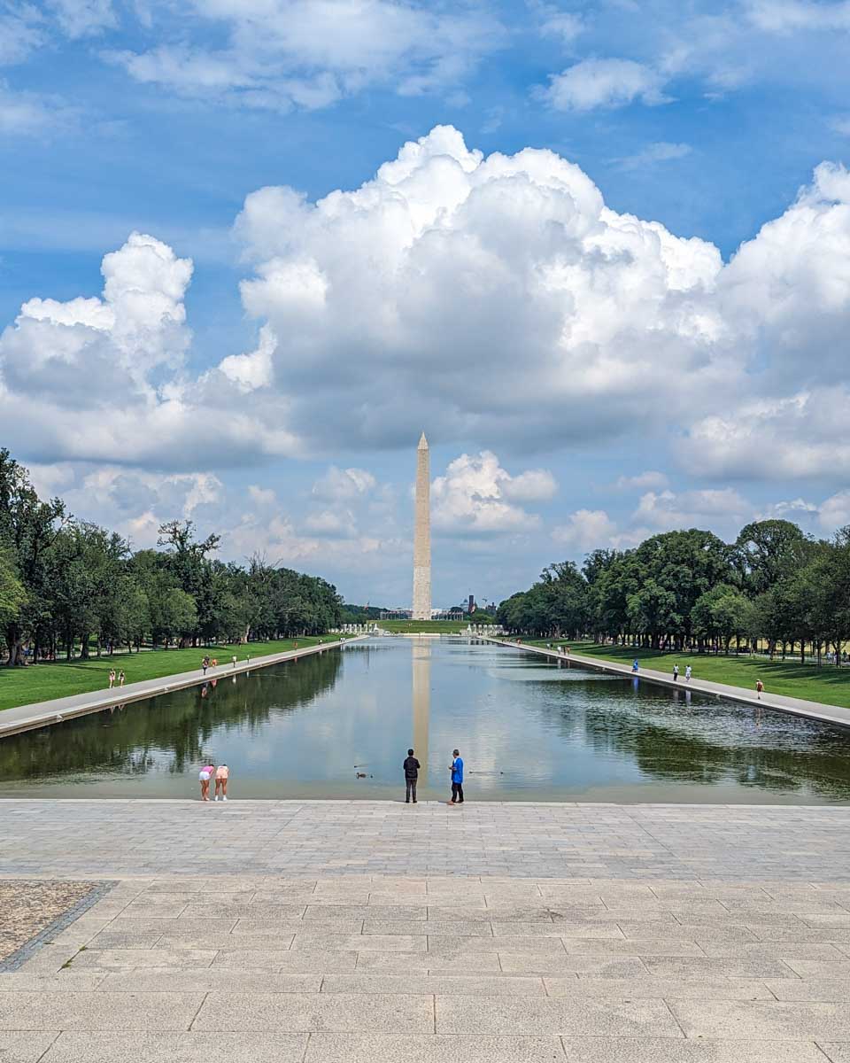 The Washington Monument sits behind the Lincoln Memorial reflection Pool 1