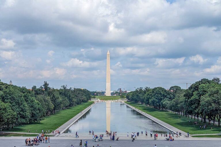 The Washington Monument sits behind the Lincoln Memorial reflection Pool in Washington DC