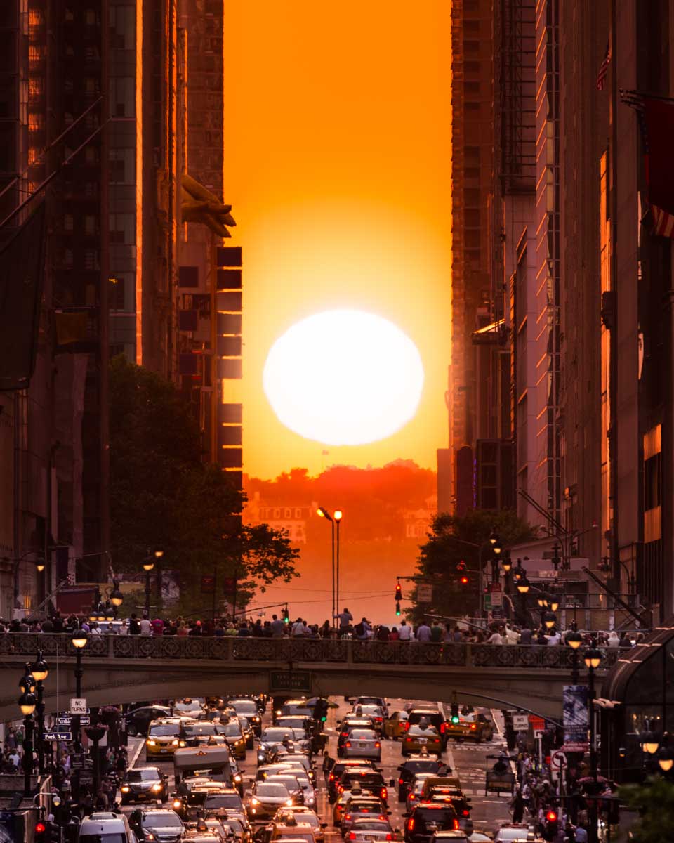 The sun sets at Manhattanhenge in NYC