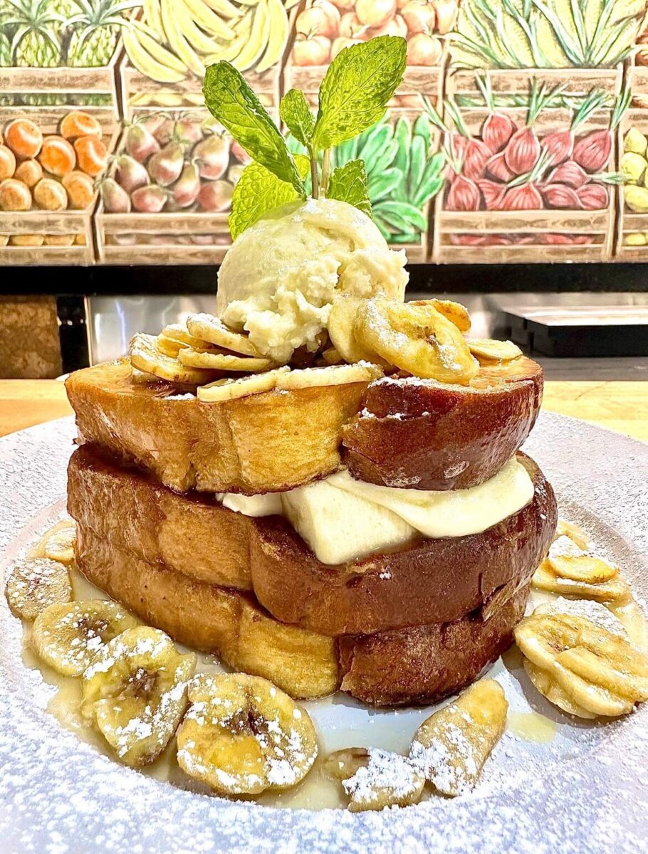 banana french toast stacked with ice cream from Green Eggs Cafe