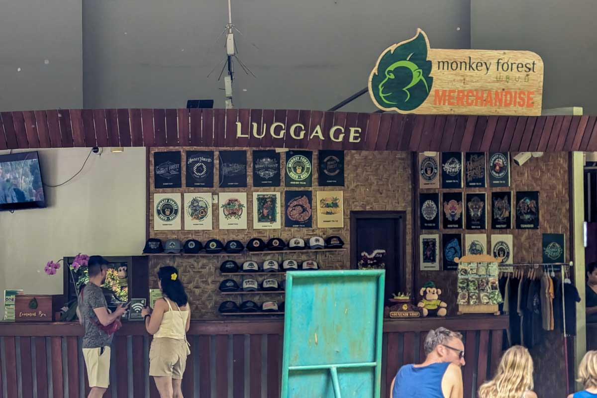 A kiosk that says luggage at Ubud Monkey Forest Bali