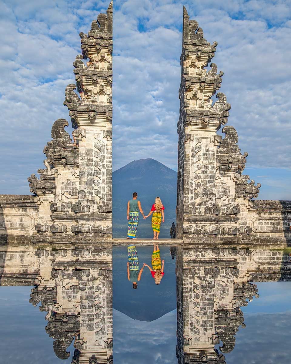 Bailey and Daniel pose for a photo at Lempuyang Temple in Bali