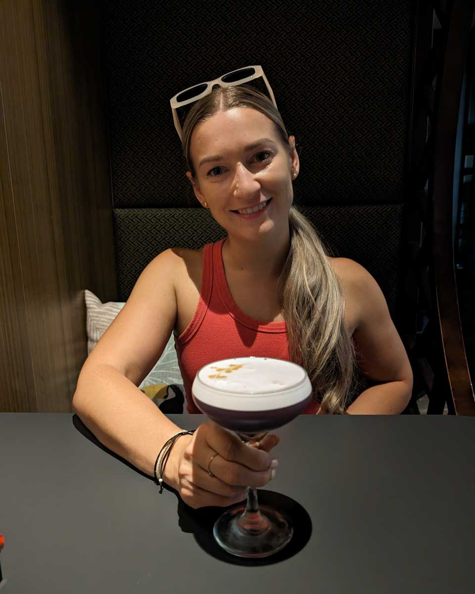 Bailey drinks a cocktail in Philadelphia, USA