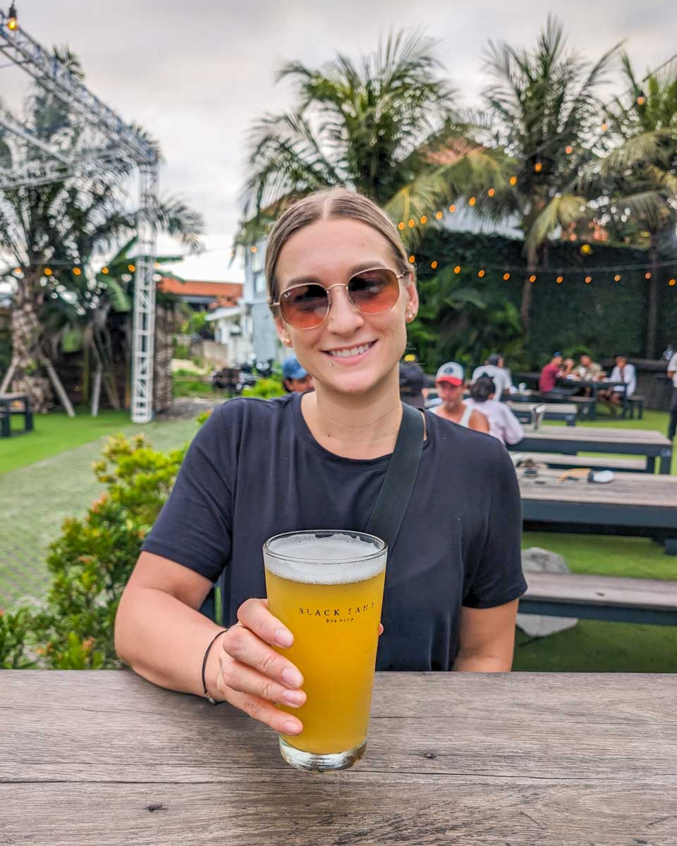Bailey enjoys a beer at Black Sand Brewery in Canggu, Bali