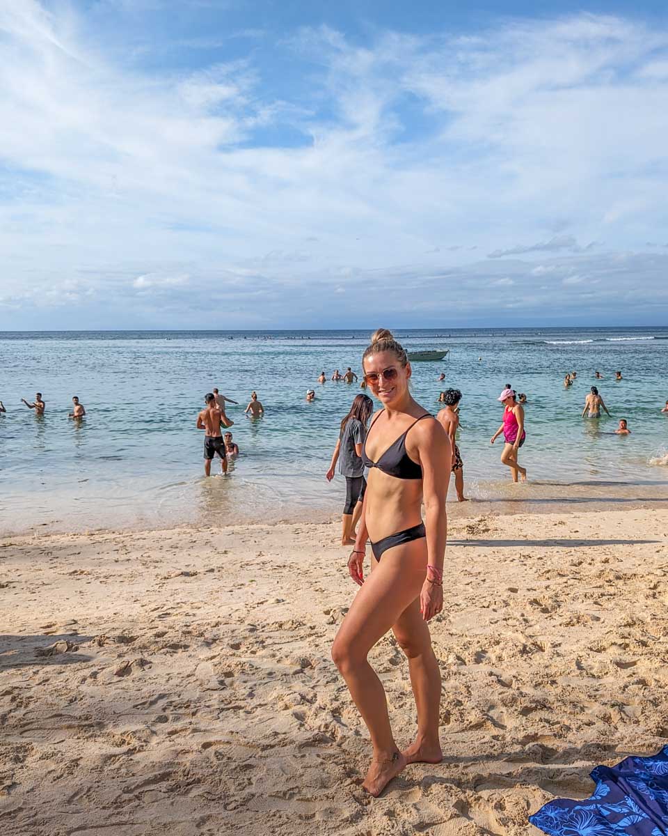 Bailey poses for a photo on Padang Beach in Uluwatu, Bali