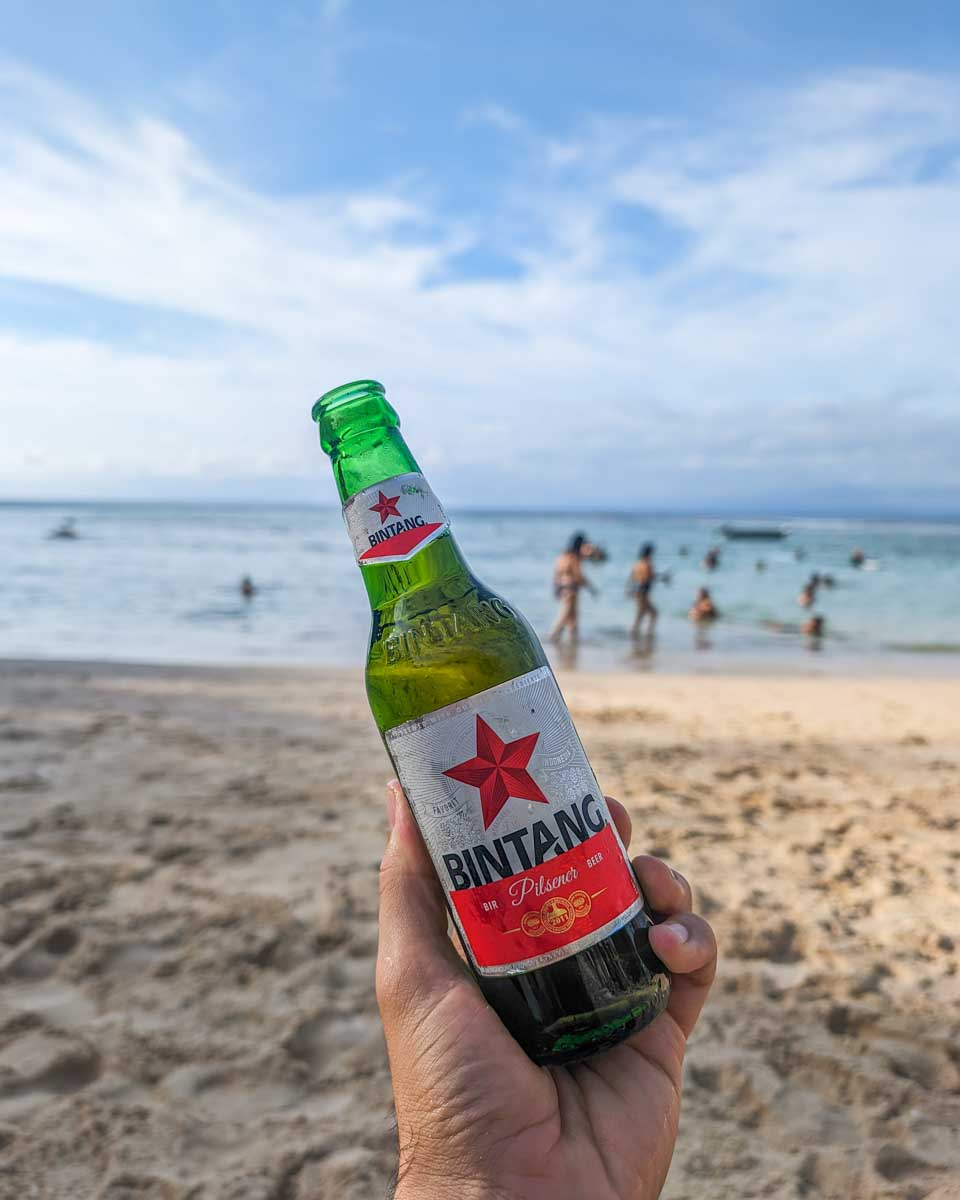 Having a Bintang at Padang Beach in Uluwatu, Bali