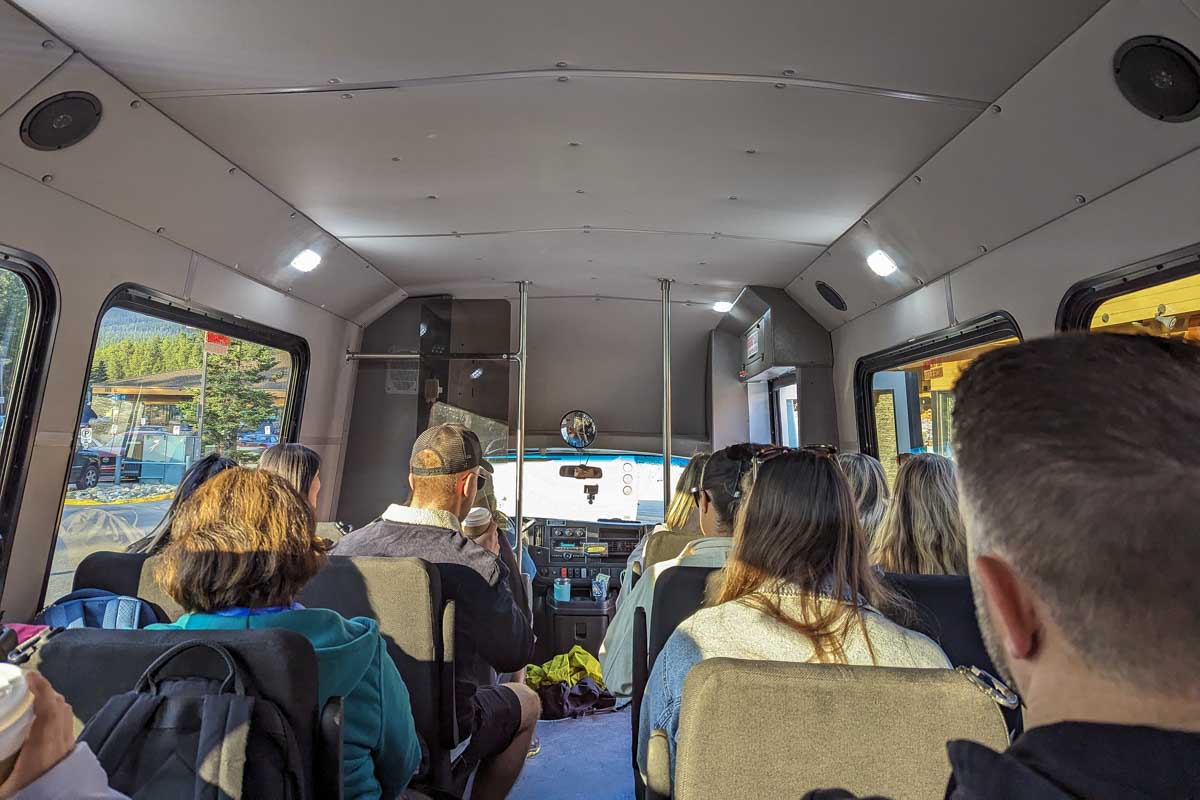 People on the Moraine Lake Bus Company Shuttle canada