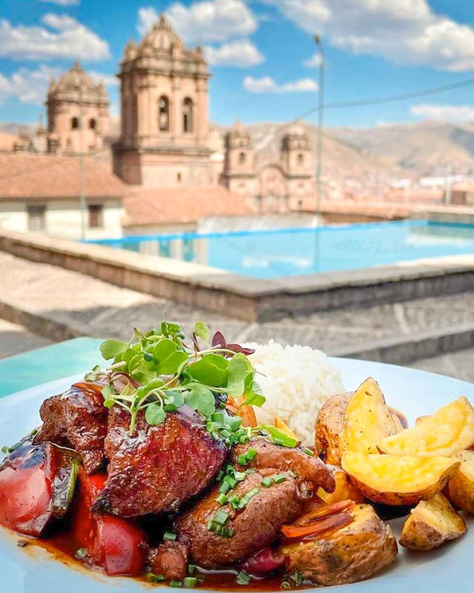 Rucula Peruvian Restaurant meal with a view of Cusco