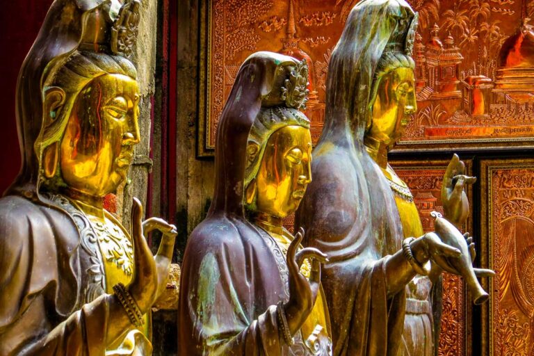 Statues in Gangaramaya Buddhist Temple in Colombo, Sri Lanka