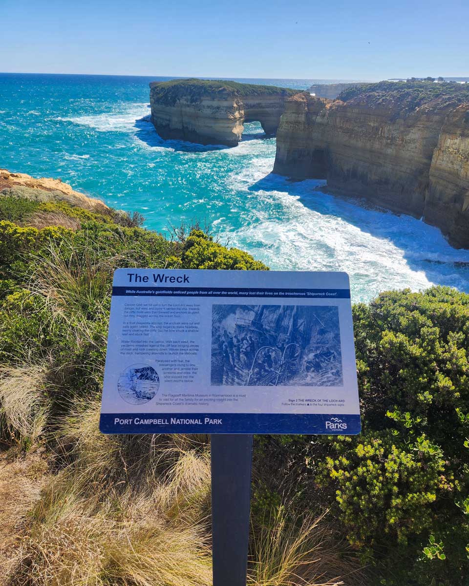 A sign at loch ard gorge overlooking the ocean on the great ocean road australia