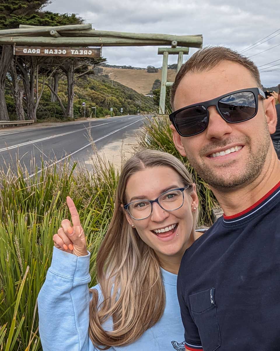 Bailey and Daniel take a selfie on the Great Ocean Road sign