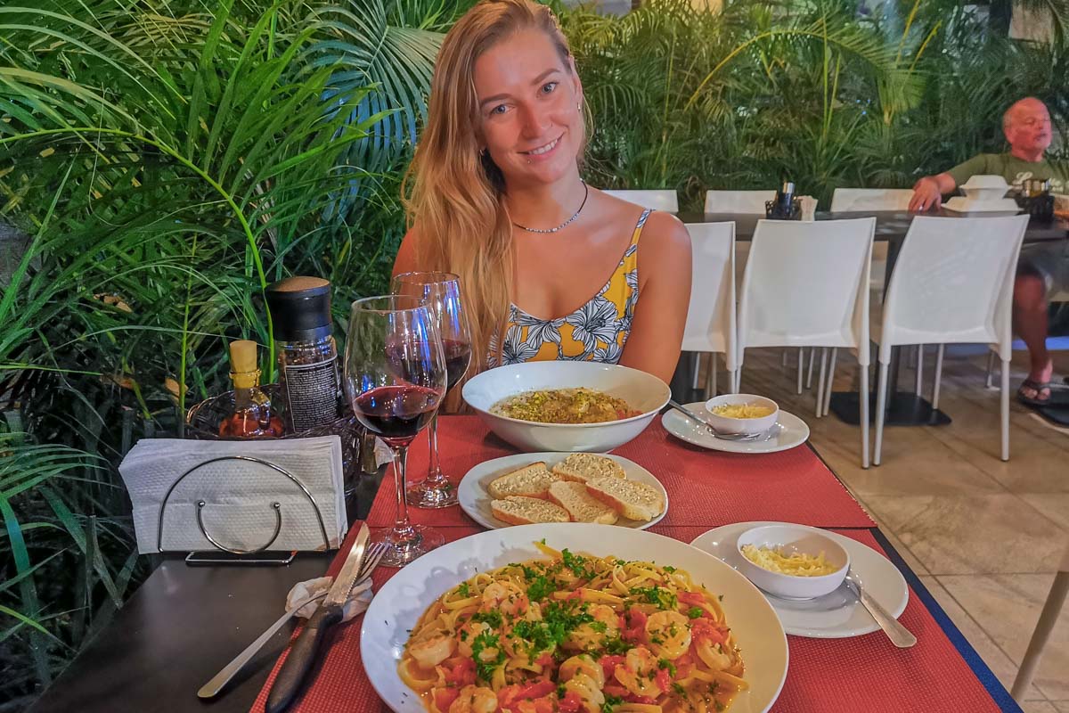 Eating Italian food at Antichi Sapori Tamarindo on a night out in Tamarindo, Costa Rica
