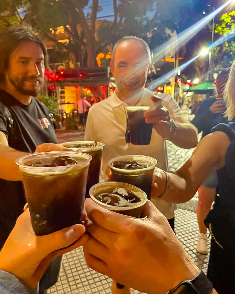 A tour group drinks together at the end of a sherpa food tour in Buenos Aires Argentina