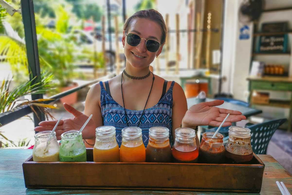 Bailey-poses-with-a-bunch-of-Salsa-on-a-food-tour-in-Puerto-Vallarta-Mexico through get your guide