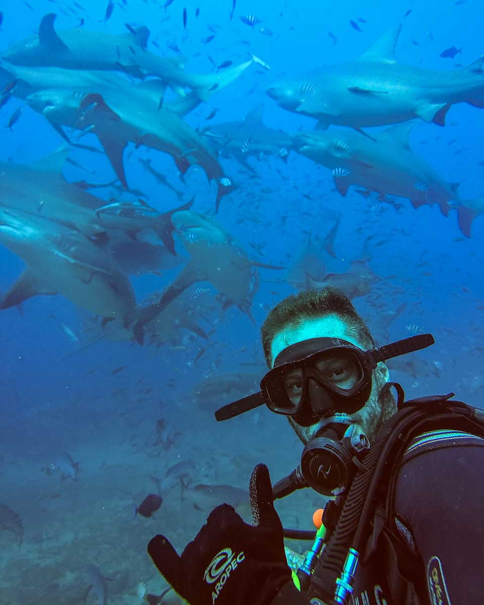 Daniel-giving-a-thumbs-up-underwater-during-a-shark-dive-fiji through get your guide