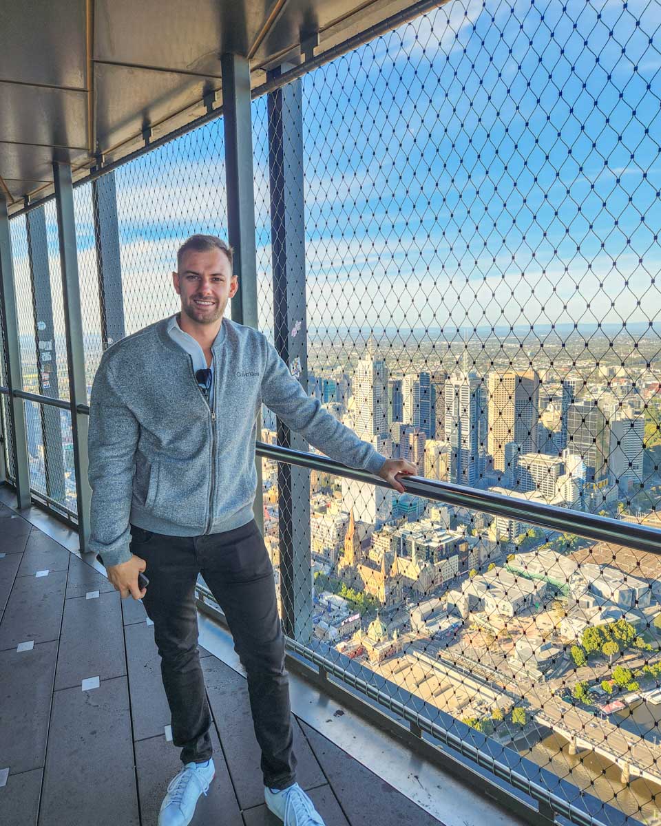 Daniel poses for a photo at the Melbourne Skydeck