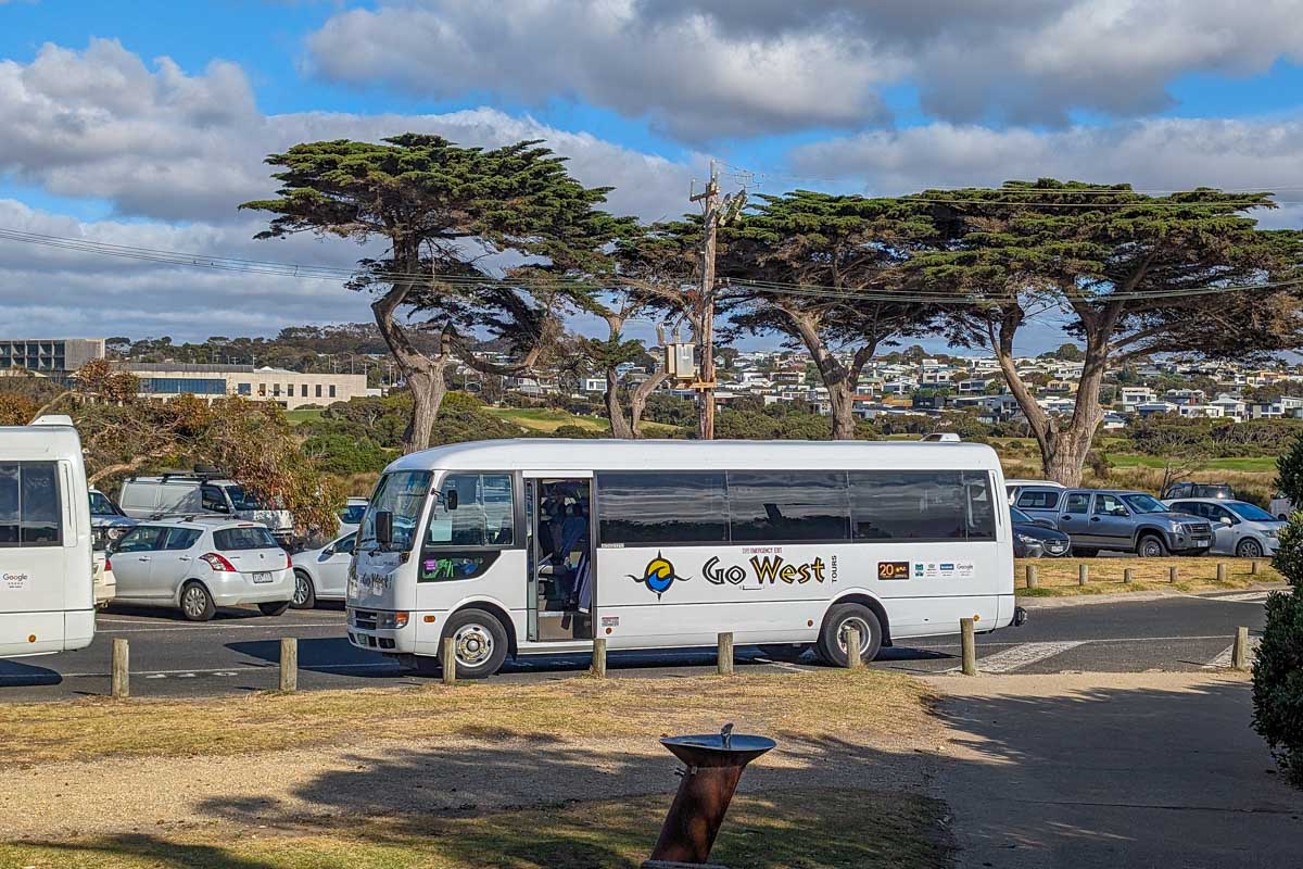 A go west tour bus at Bells Beach on the Great Ocean Road