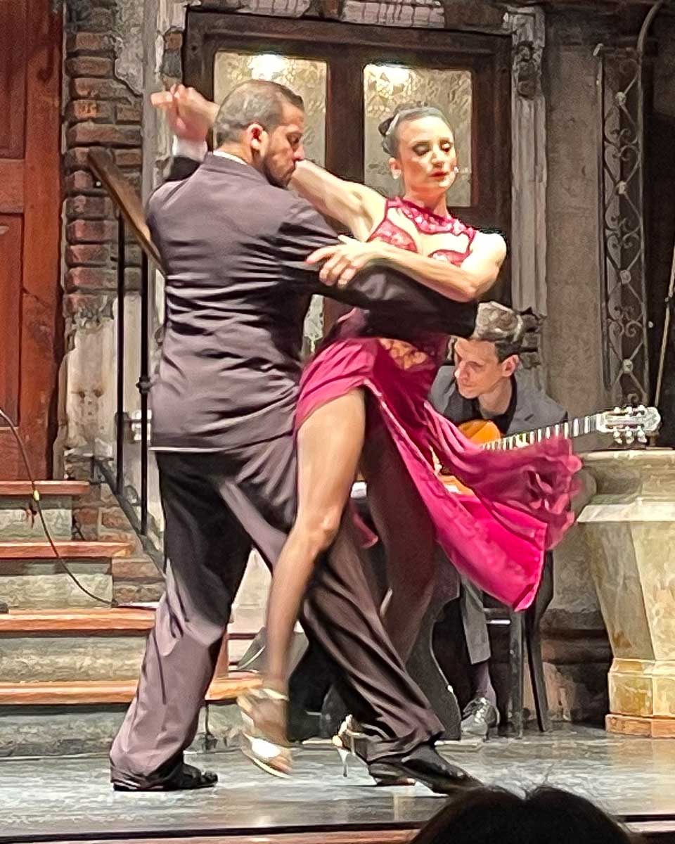 Two people tango together at La Ventana Buenos Aires Argentina