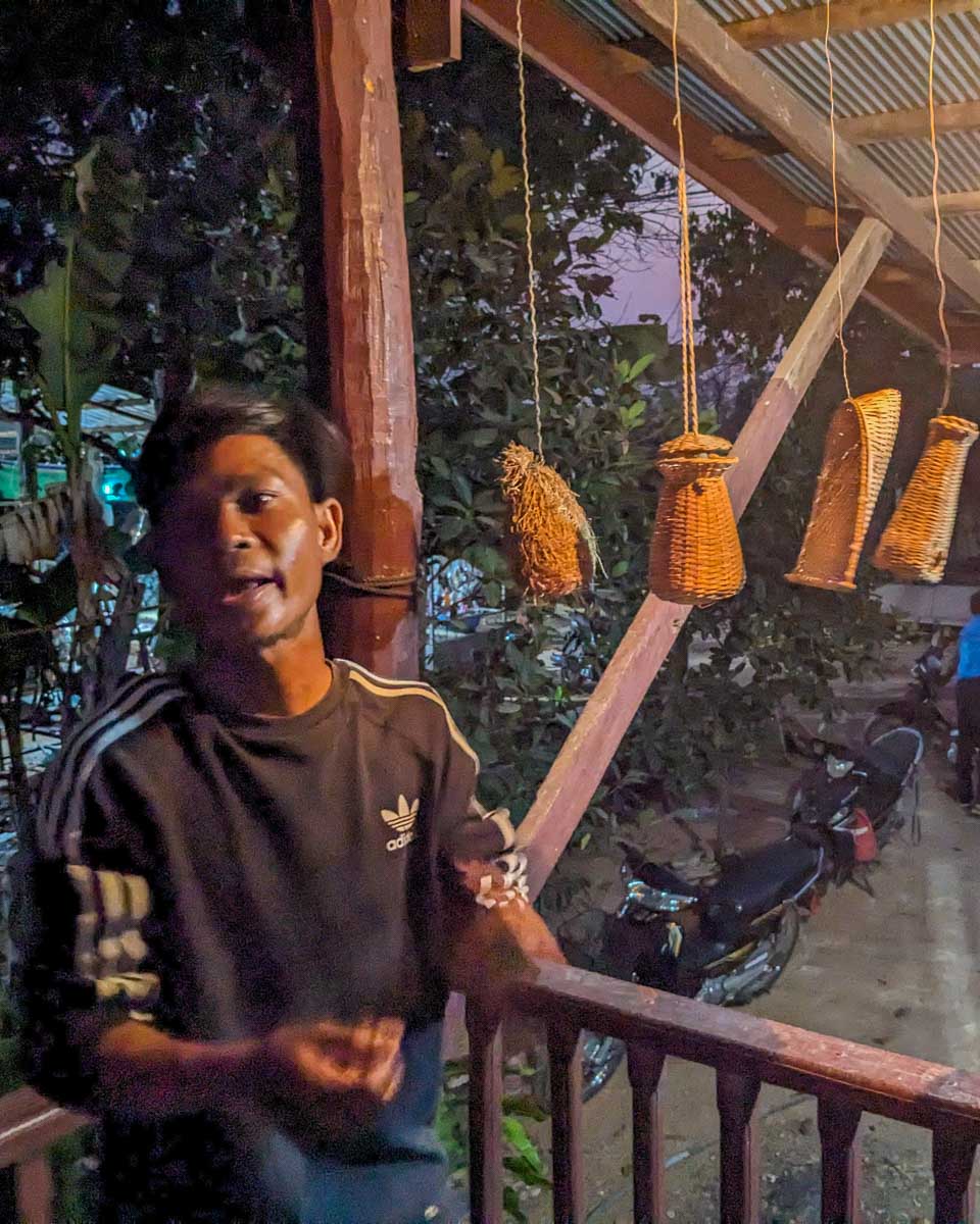 A Cambodian man shows fishing methods on a food tour from Siem Reap Cambodia-2