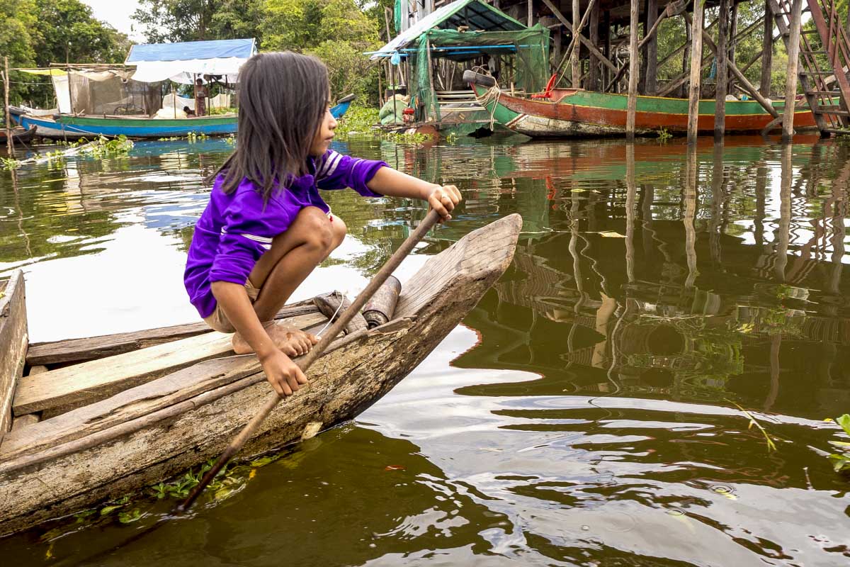 A Cmbodian girl on Tonle Sap near Siem Reap Cambodia