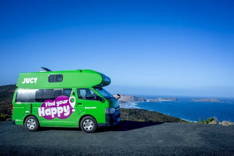A-jucy-campervan-overlooking-the-ocean-in-Australia