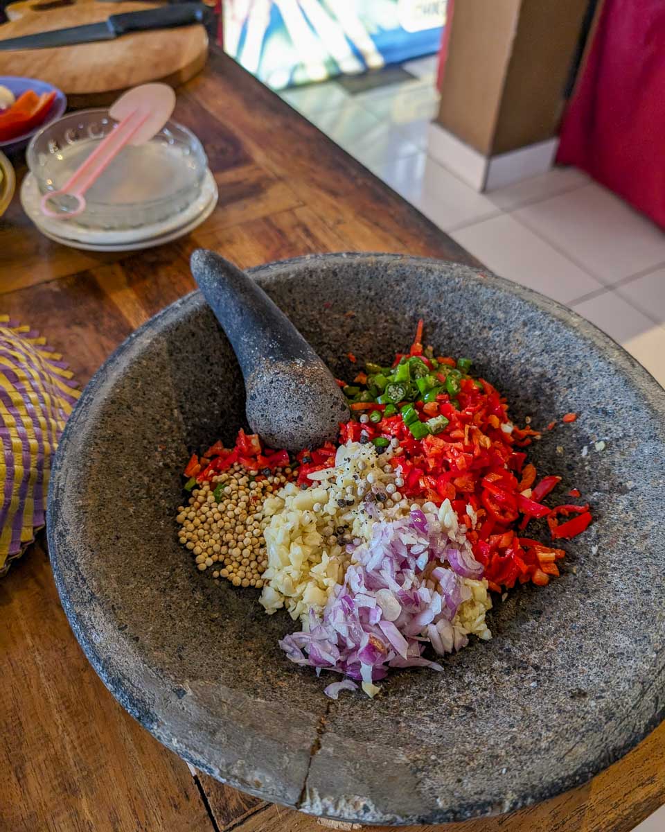 A stone bowl used for grinding up ingredients during a cooking class in Ubud Bali