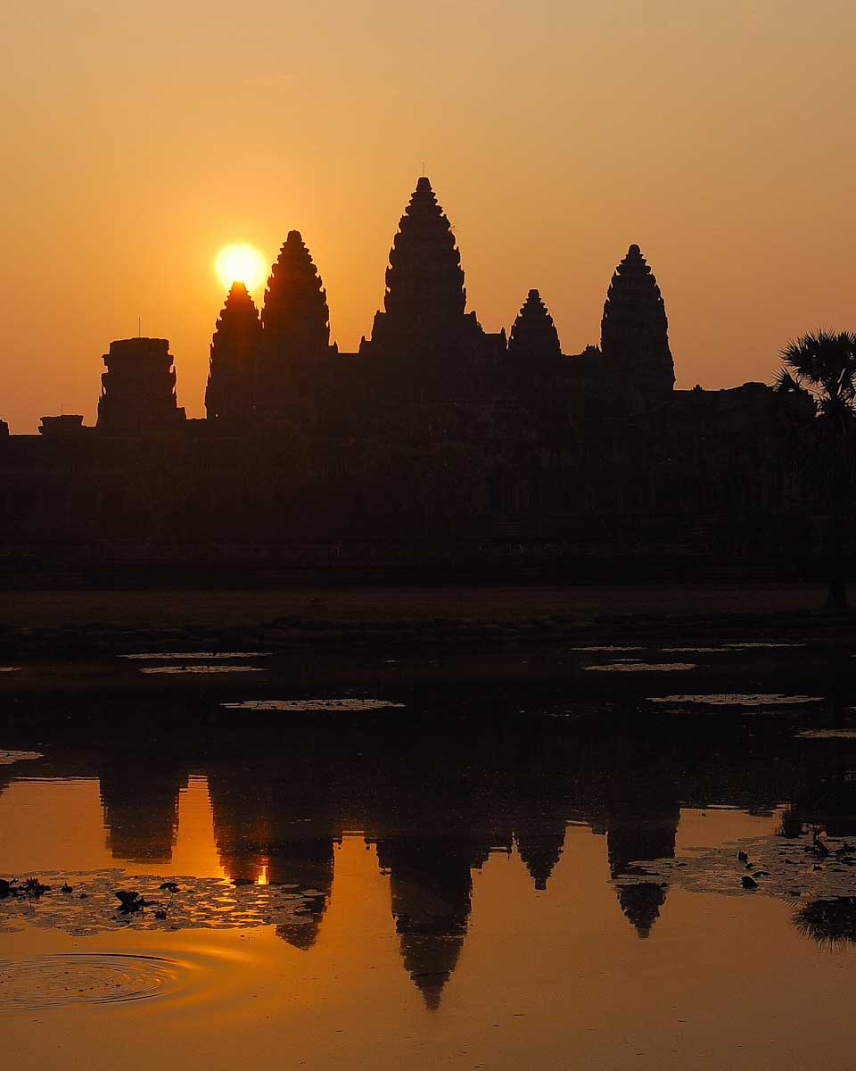 Angkor Wat Temple at sunrise with water Siem Reap Cambodia