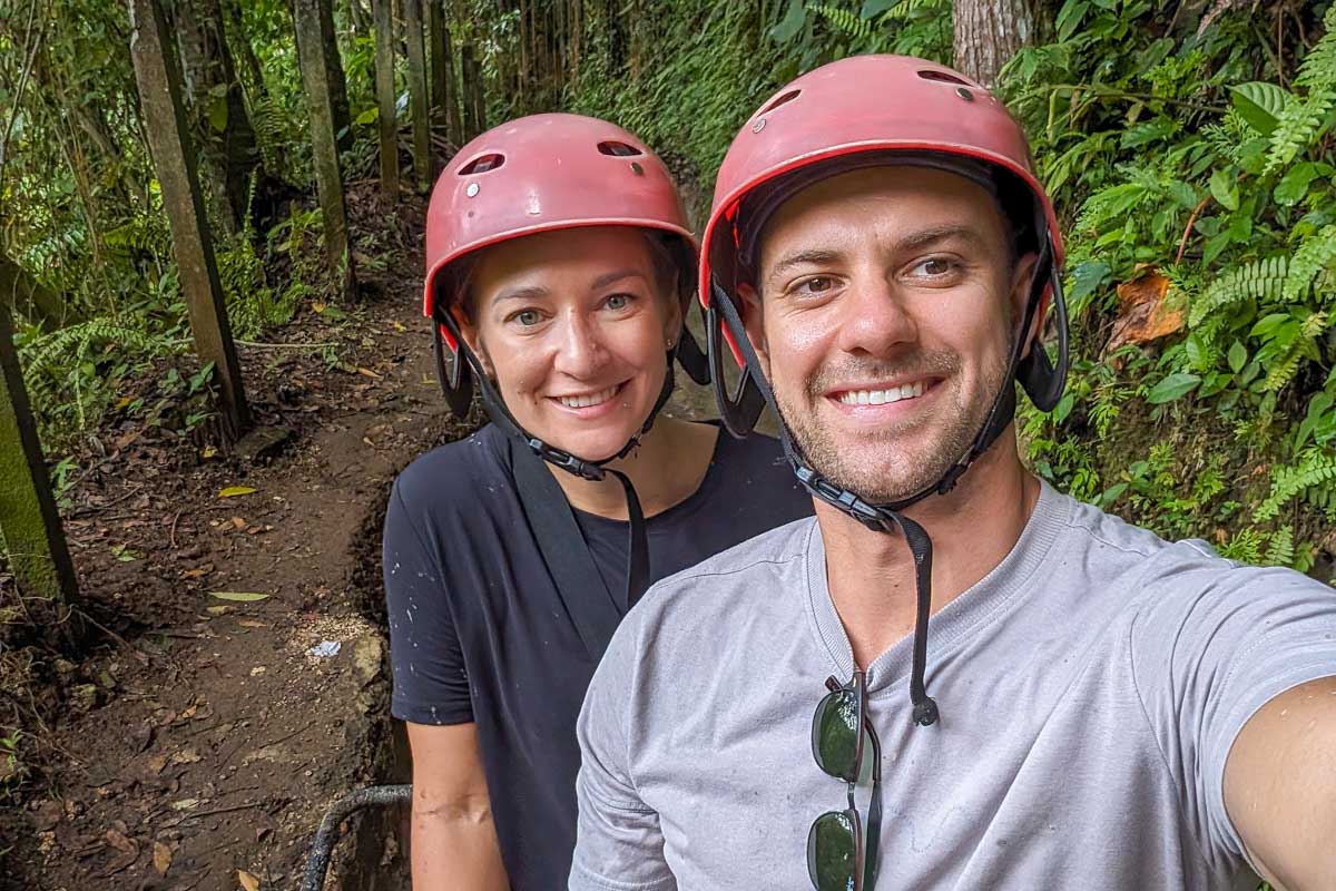 Bailey and Daniel take a selfie in the jungle on an ATV tour in Bali