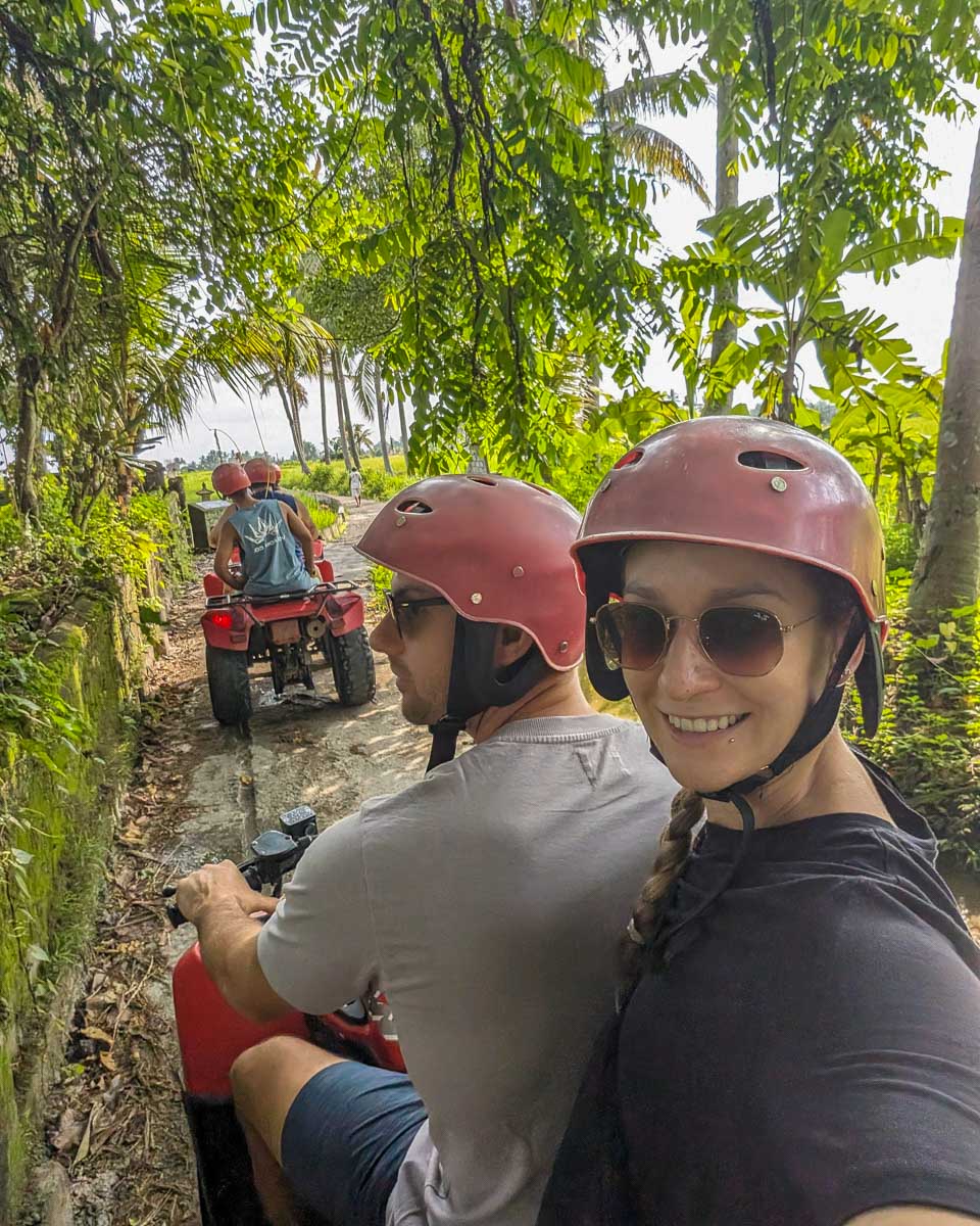 Bailey takes a selfie on the back of an ATV in Bali on a tour