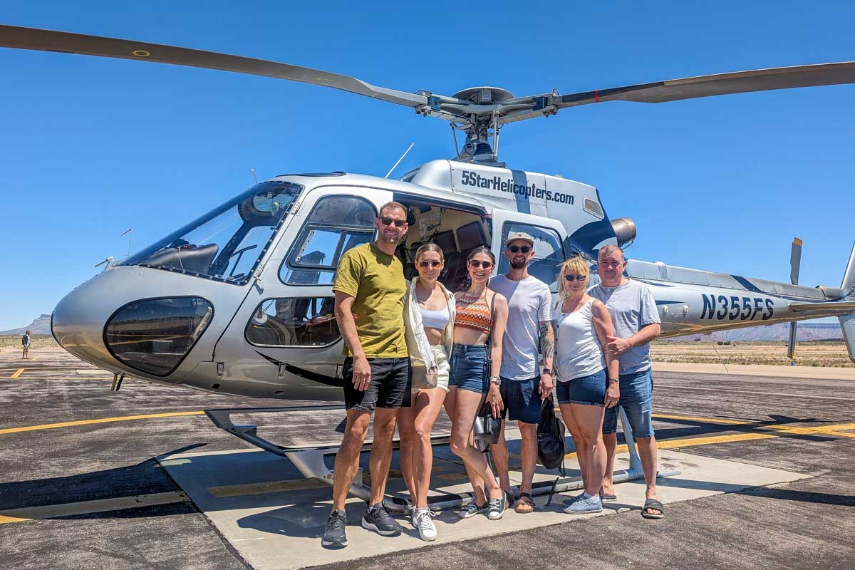 People in front of a helicopter on a tour to the grand canyon from las vegas USA