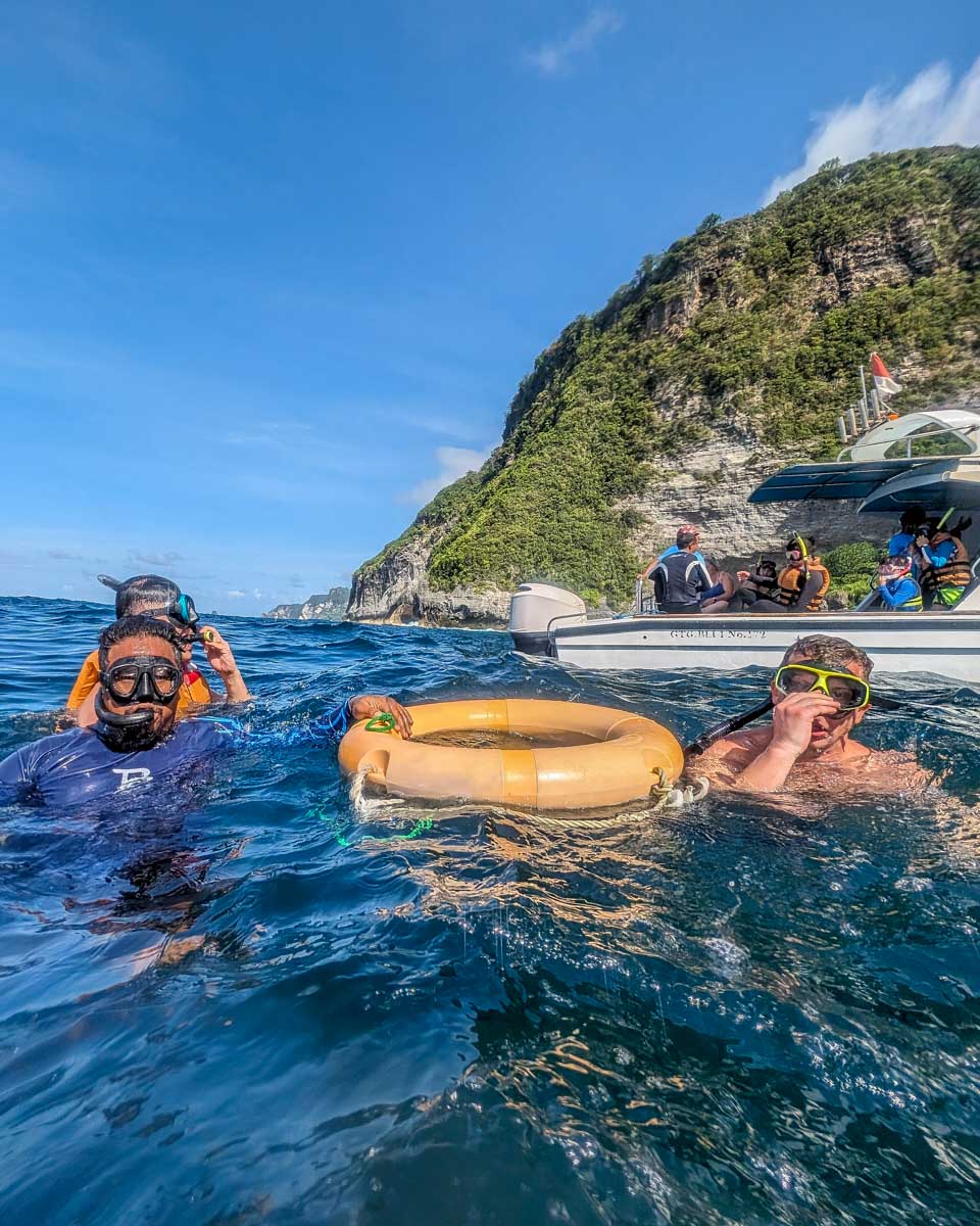 People snorkel on a tour to Nusa Penida Bali