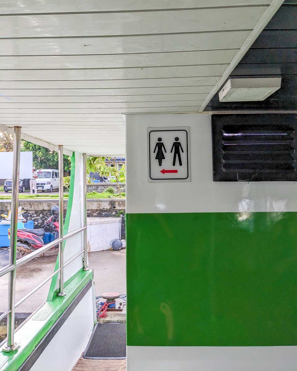 Sign for the bathroom on a boat on a whale watching tour in Mirrisa Sri Lanka
