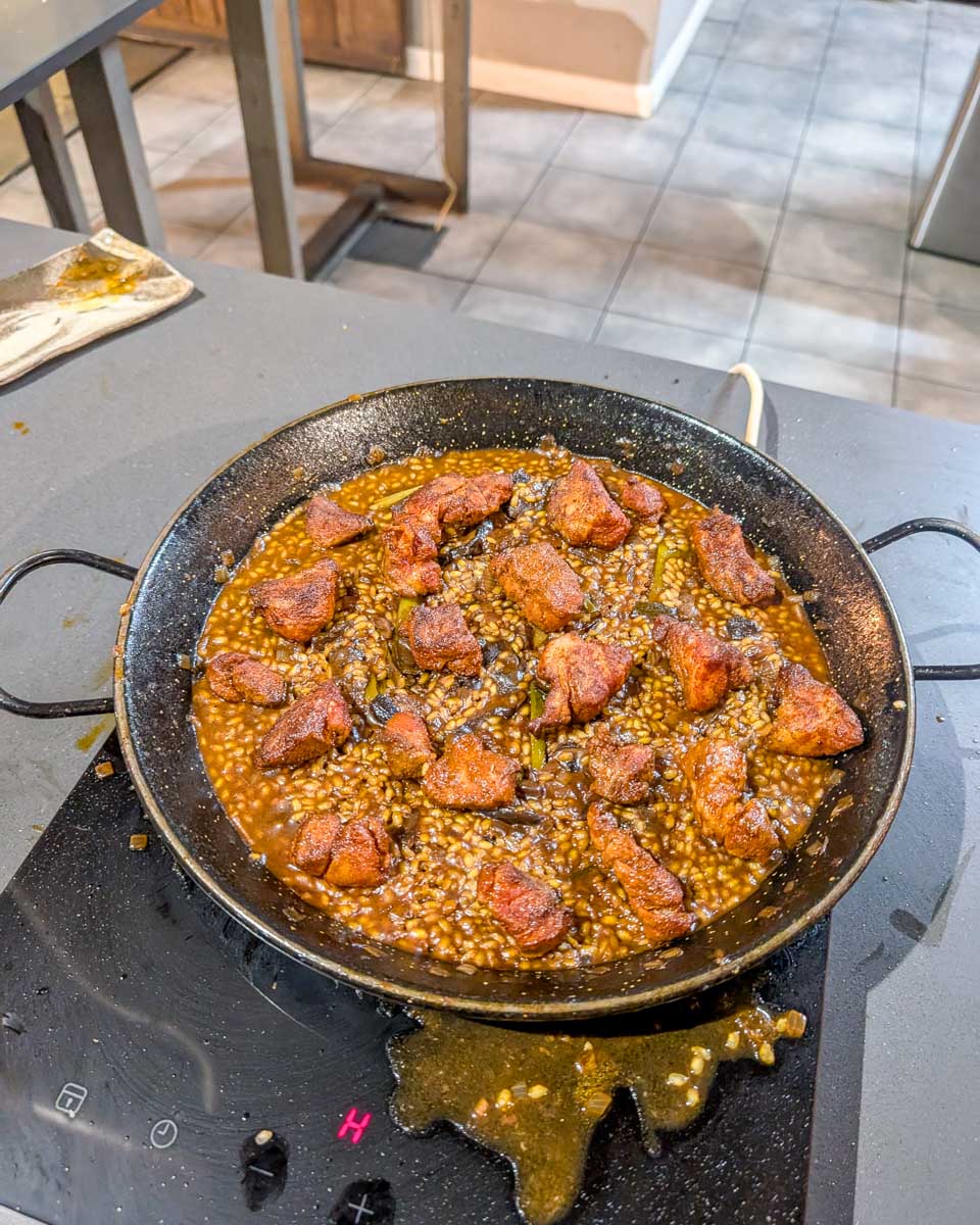 A pan of paella during a Paella making class in Barcelona Spain