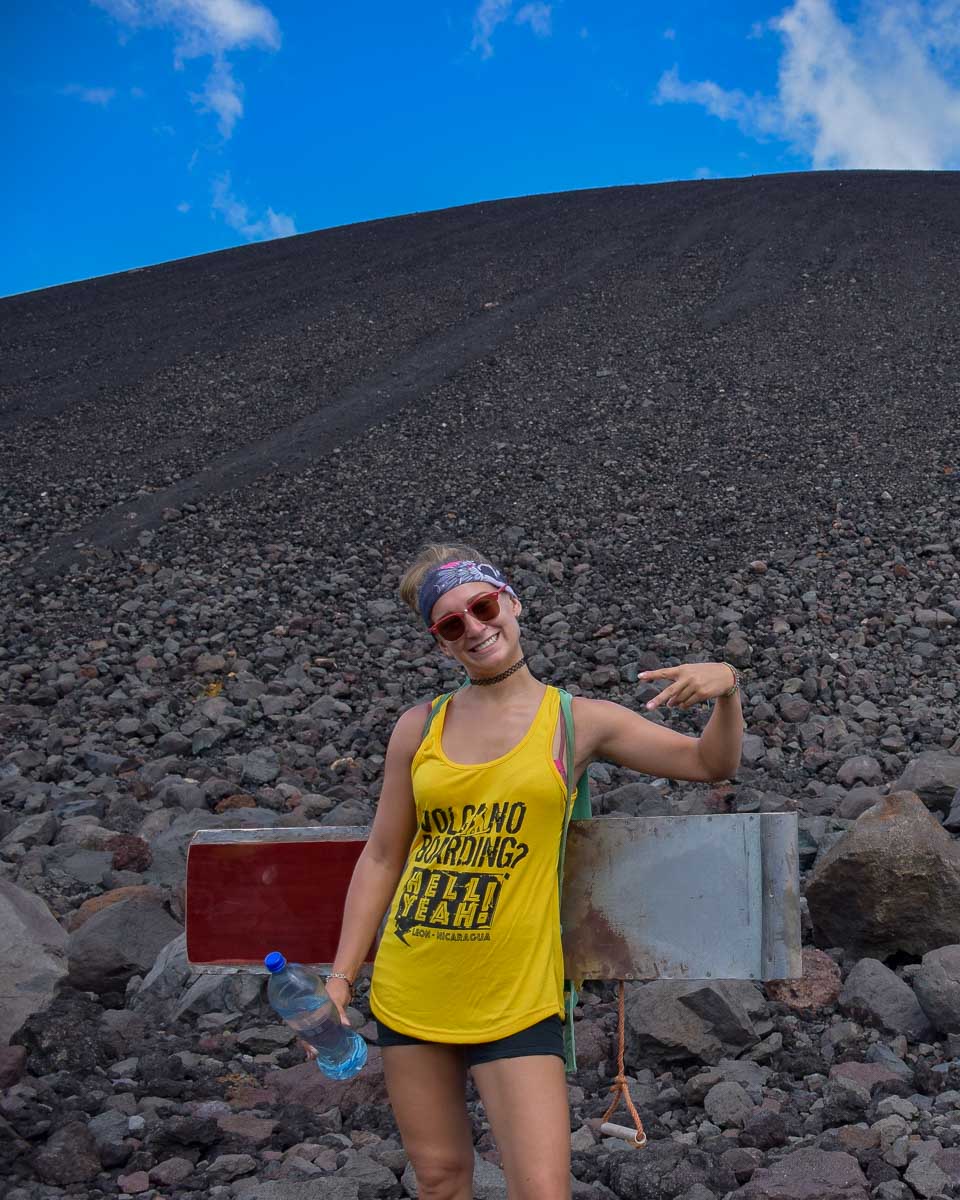 Bailey poses on cerro negro while volcano boarding Nicaragua