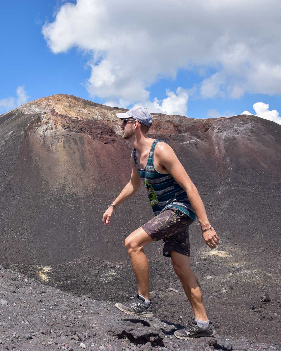 Daniel climbs Cerro Negro while volcano boarding in Nicaragua