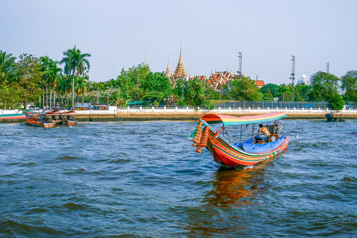 A colorful longboat on the chao phraya river in Bangkok Thailand