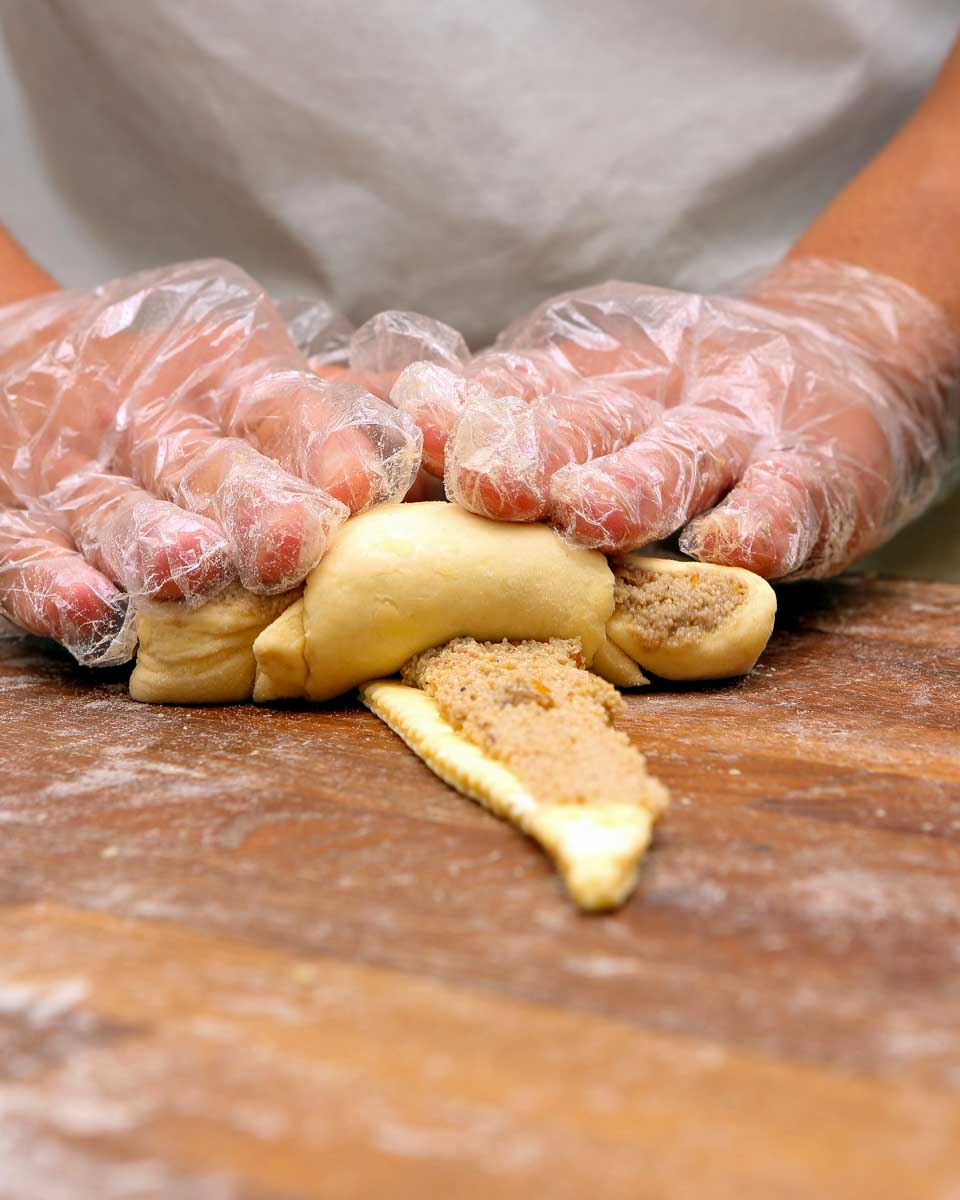 A person making croissants during a cooking class in Paris France