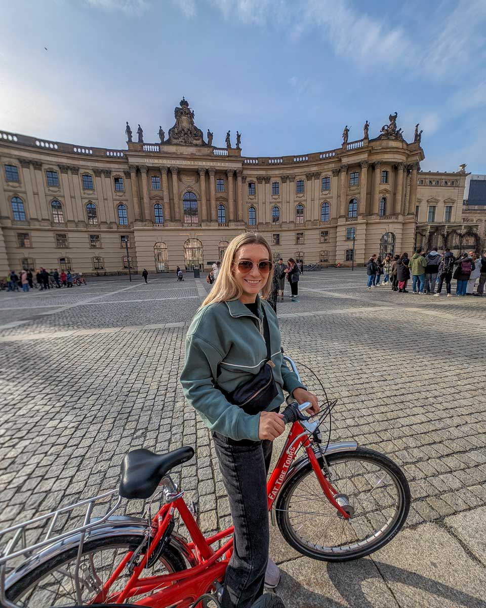 Bailey on a bike smiling in Berlin Germany