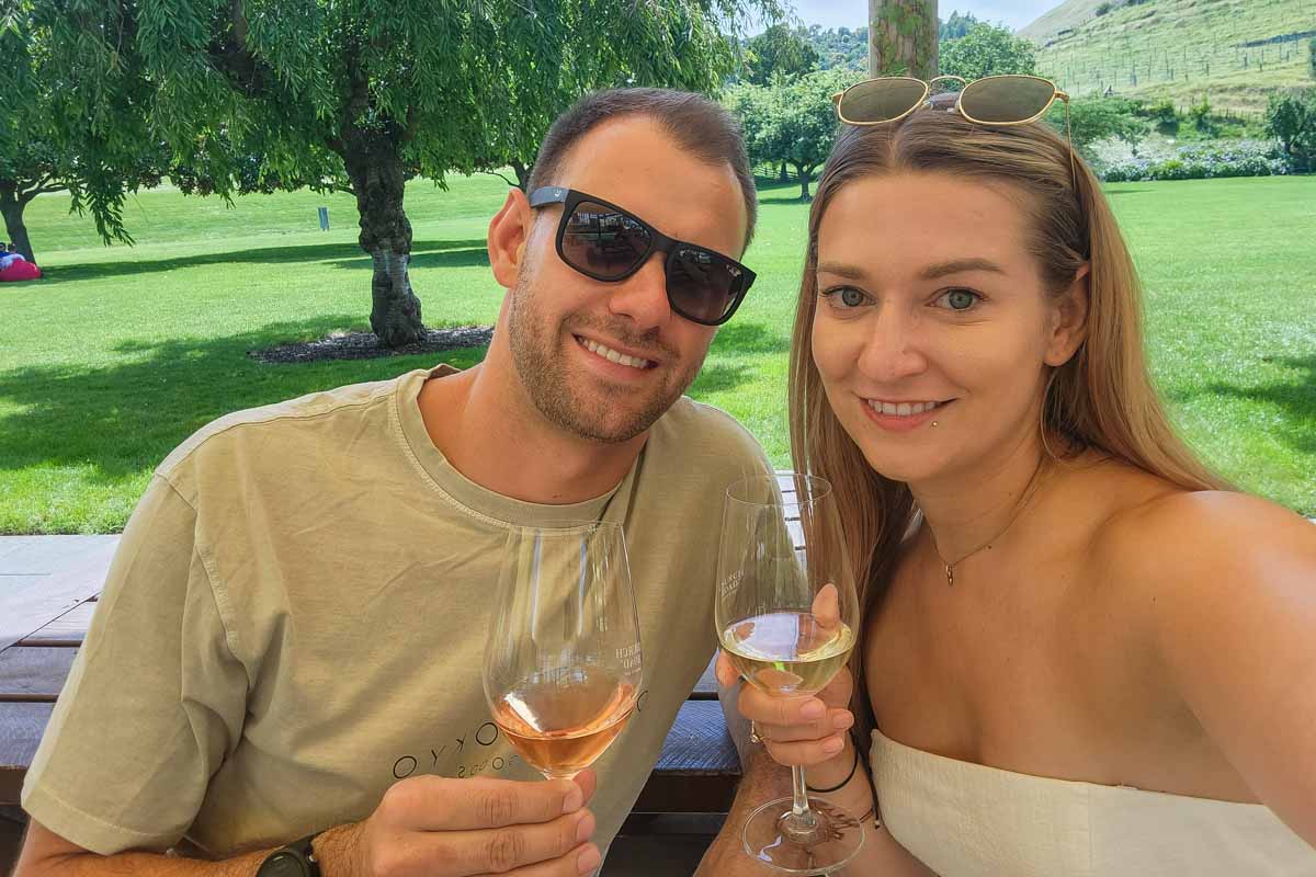 Daniel and Bailey take a selfie while drinking wine in France