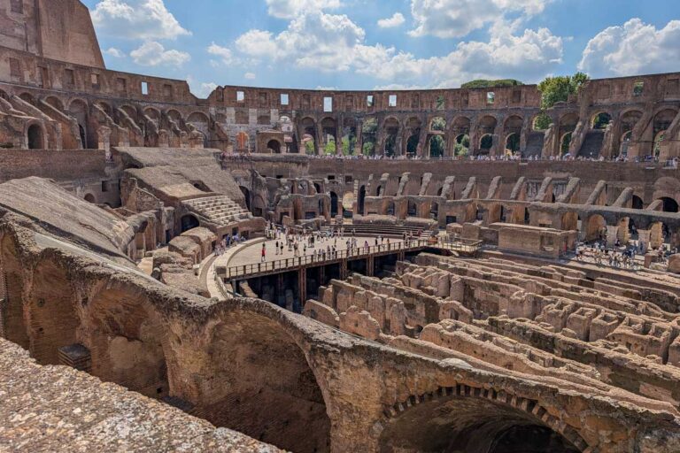 Looking down at the arena in the colosseum in Rome Italy