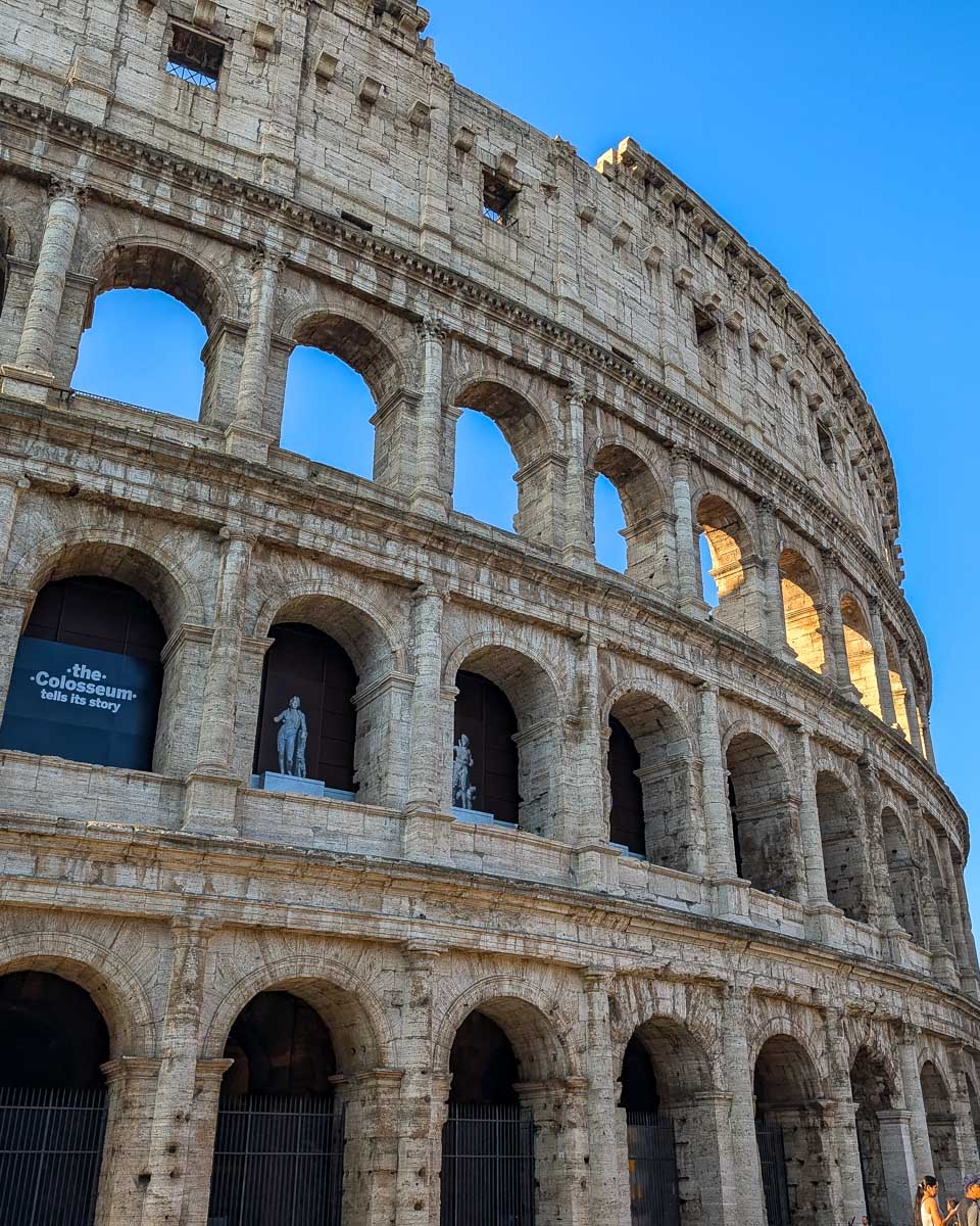 Looking up at the colosseum in Rome Italy