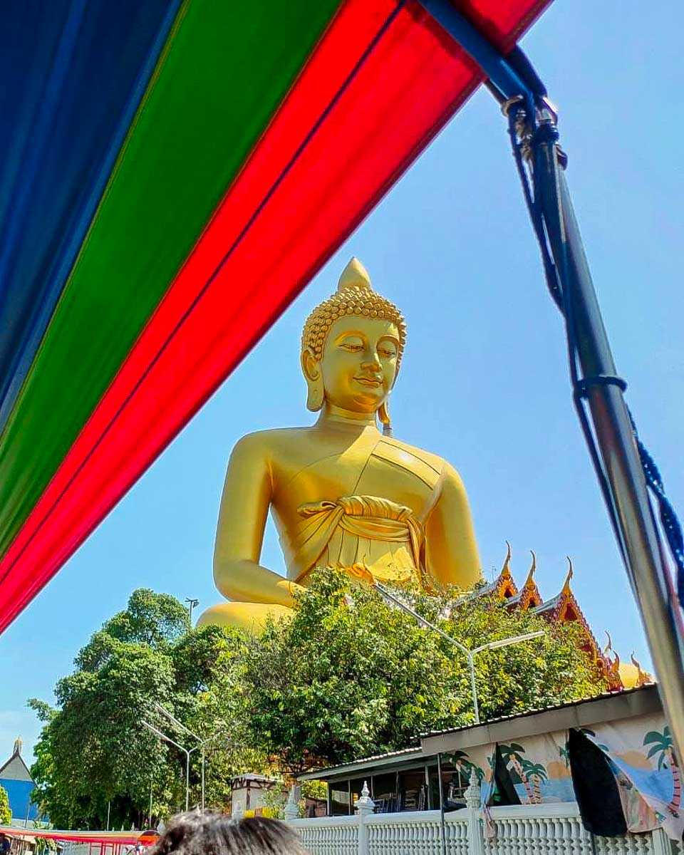 WanderSiam golden Buddha on the Bangkok Thailand canal