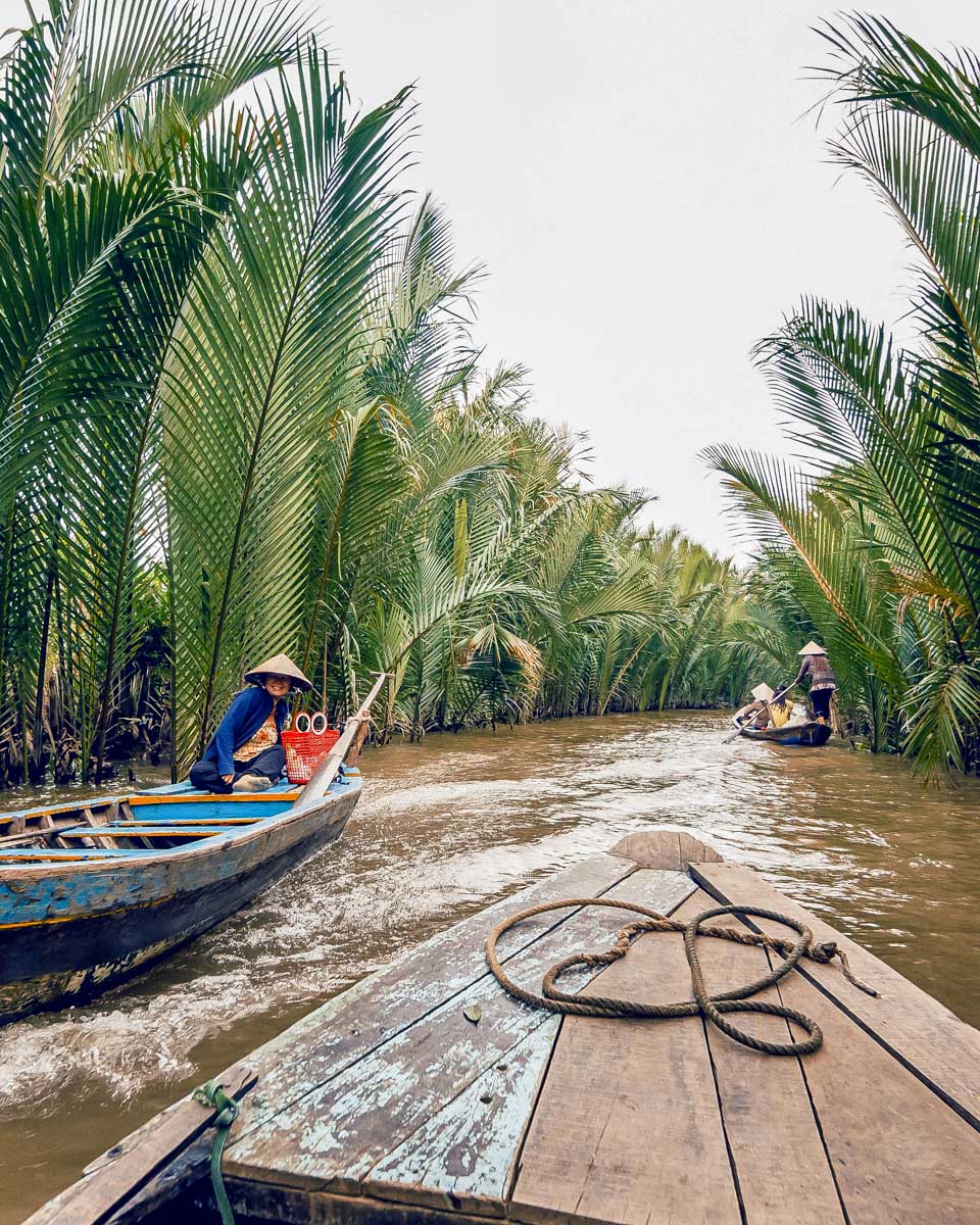 A boat going down the Mekong Delta on a tour from Saigon Ho Chi Minh Vietnam